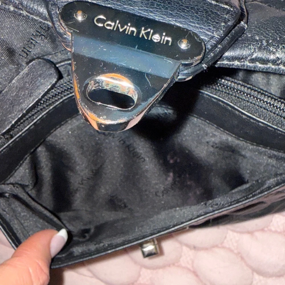 Calvin Klein Black Quilted Crossbody Bag with Silver Accents
